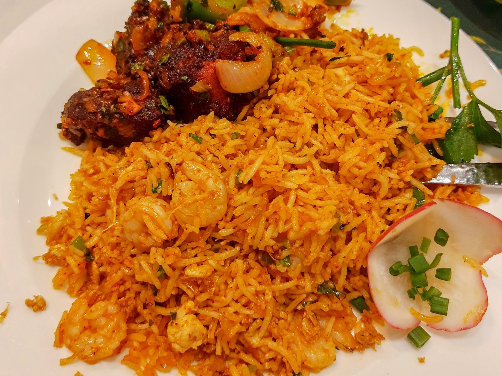 Chilly garlic seafood fried rice with fish chilli from azad star